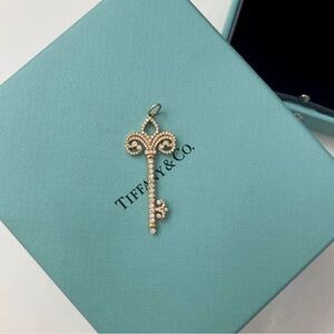 Tiffany Co Fleur de Lis 18k Rose Gold Diamond Key Pendent